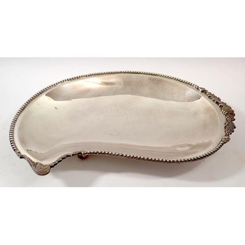 263 - A silver plated boteh form serving dish, 38cm wide