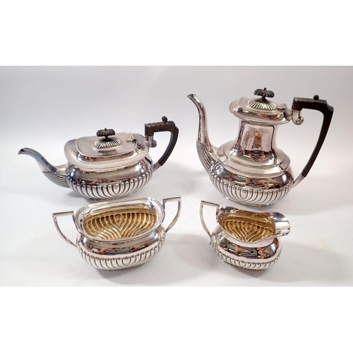 267 - A silver plated four piece tea set comprising tea pot, coffee pot, milk and sugar