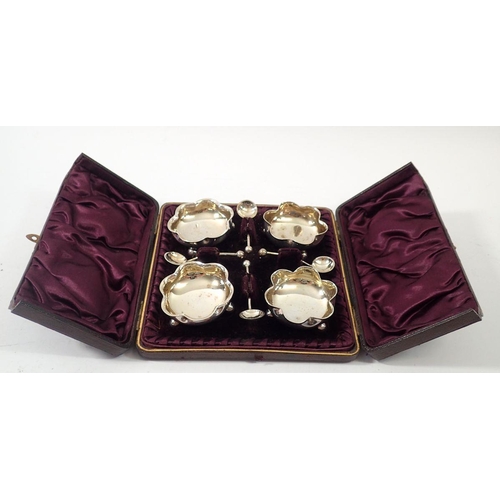 268 - A Victorian silver plated set of four salts and spoons, boxed