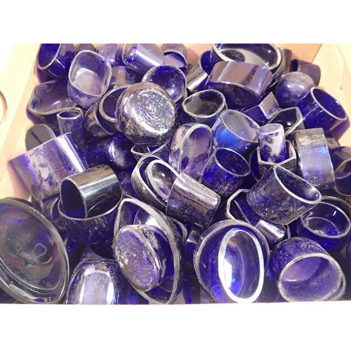 274 - A large quantity of blue glass cruet liners