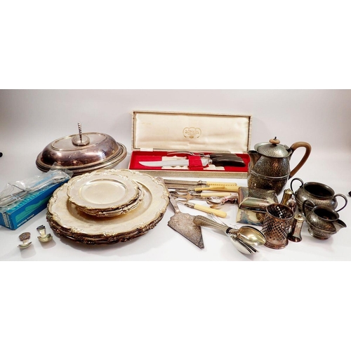 279 - A box of silver plate, pewter etc including entrée dishes, Arts & Crafts style hammered pewter water... 