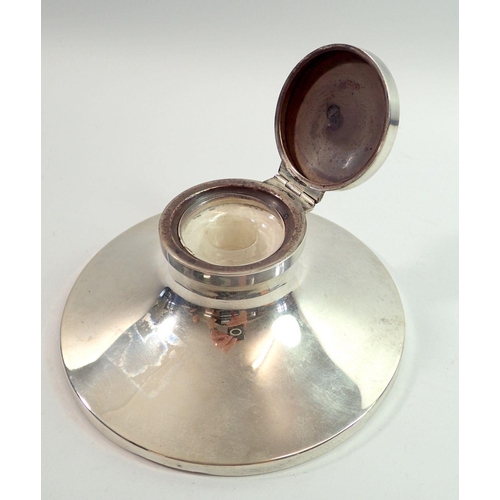 291 - A silver capstan inkwell, Birmingham 1926 by William Neale, 14cm