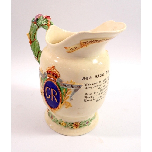 30 - A George VI Crown Devon Fieldings coronation musical jug, 20cm