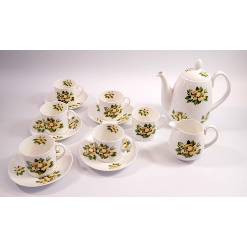 49 - A Shelley vintage tea service printed yellow flowers comprising six cups and five saucers and milk j... 