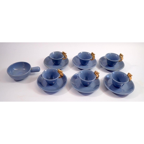 50 - A blue pottery set of six coffee cups and saucers with gilt sea horse handles and a Gallo wine taste... 