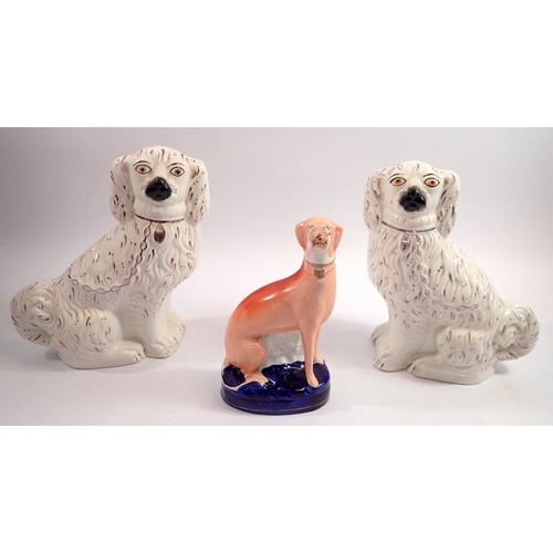 66 - A pair of Victorian Staffordshire dogs, 24cm and a greyhound - a/f