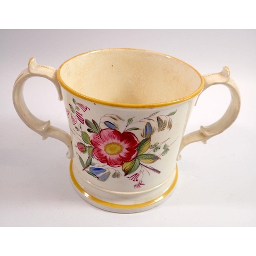 68 - A large Victorian two handled loving cup painted flowers, 13cm