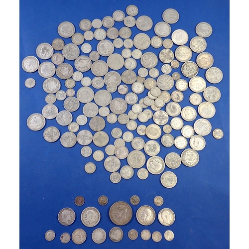 703 - A group of British silver coins - 1038g total weight pre-1947 including George V crown 1935, half cr... 