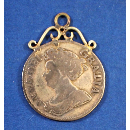 710 - A group of British silver coins including Anne shilling mounted as pendant, Victoria - George VI thr... 