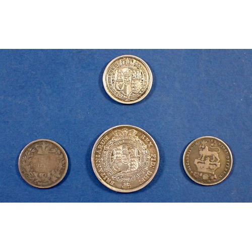 711 - A George III half crown 1817, shilling 1817 (repaired crack) George IV shilling 1826 and a William I... 