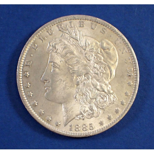 731 - An 1885 USA silver one dollar