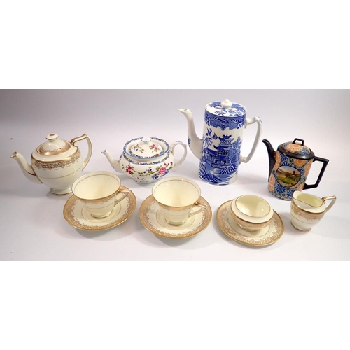 74 - A Doulton gilt and cream tea for two set comprising teapot, two cups and saucers, milk, sugar and on... 