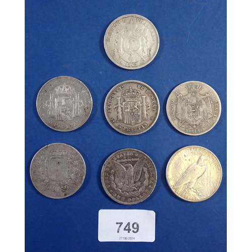 749 - An interesting mix of seven world silver coins including USA dollars x2 1889 and 1923, Napoleon III ... 