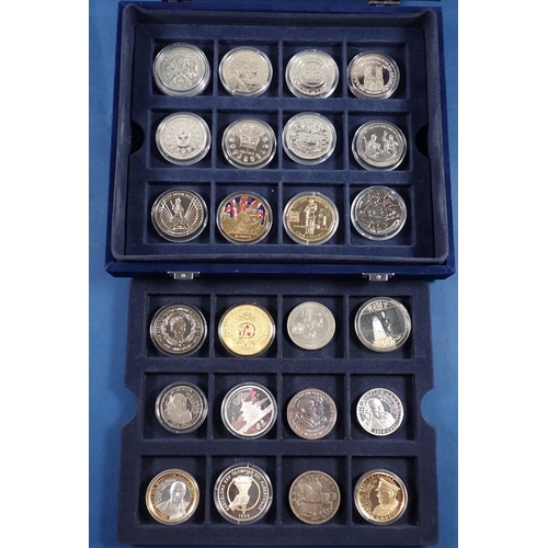 768 - A collection of boxed commemorative coins including some silver Westminster examples, Churchill, D-D... 