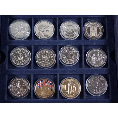 768 - A collection of boxed commemorative coins including some silver Westminster examples, Churchill, D-D... 