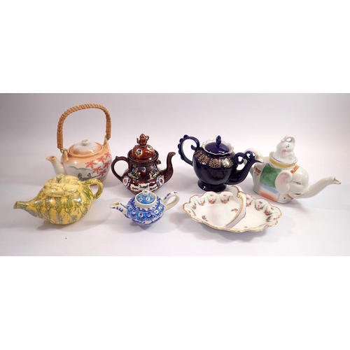 79 - A group of six small bachelor tea pots