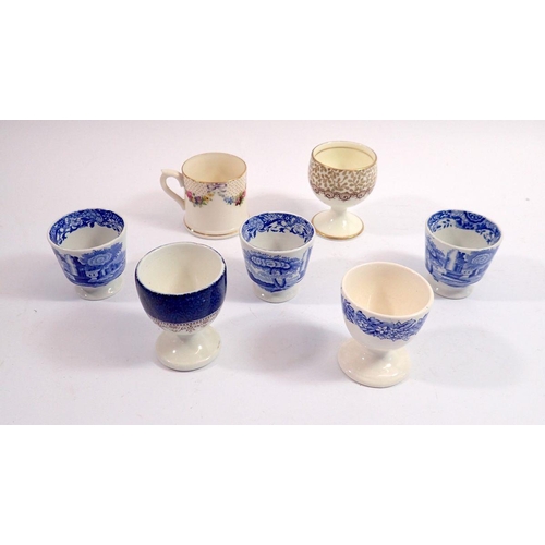 80 - A Royal Worcester miniature tankard painted swags of flowers and six various egg cups