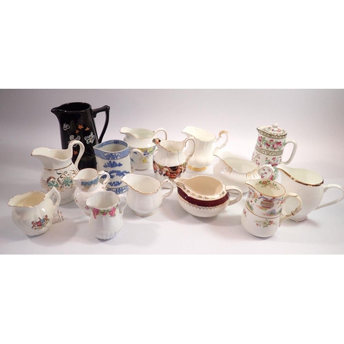86 - A collection of various porcelain jugs