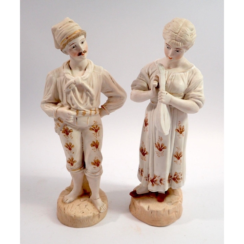 99 - A pair of Victorian Tyrolean fairing figures with mandolin, 25cm tall