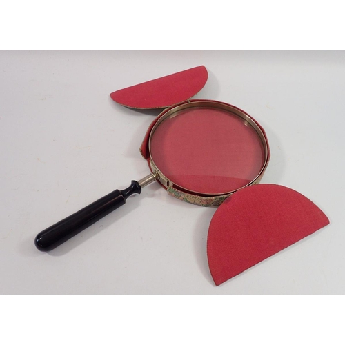 1168 - A large sized magnify glass with ebonized handle, 35cm total length