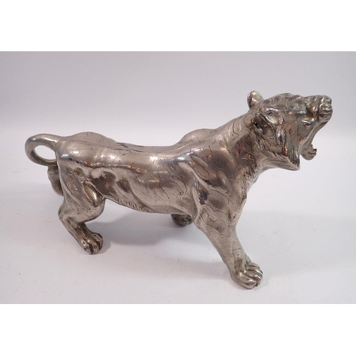 1177 - An early 20th century spelter tiger, ear a/f, 30cm long