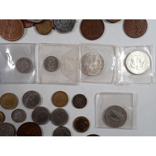 623 - A miscellaneous group of British and World coins including silver content, USA Kennedy half dollar 1... 