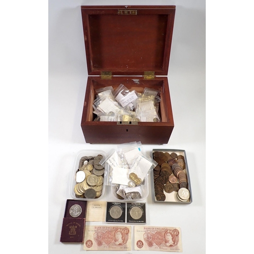 666 - A wooden box with British and world coins, pre-decimal and commemorative crowns, 10 shilling notes x... 