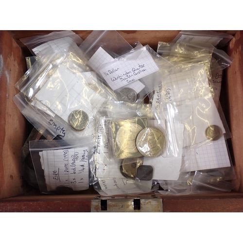 666 - A wooden box with British and world coins, pre-decimal and commemorative crowns, 10 shilling notes x... 