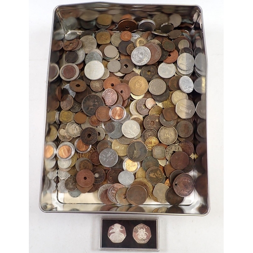 685 - A tin of miscellaneous world coins