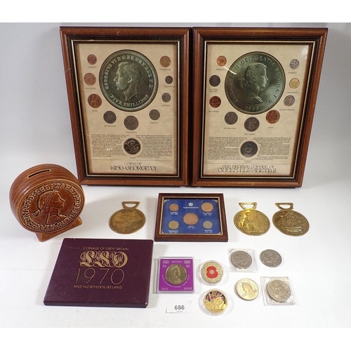 686 - A miscellaneous coin group including framed coins of King George VI and framed pre-decimal coinage o... 