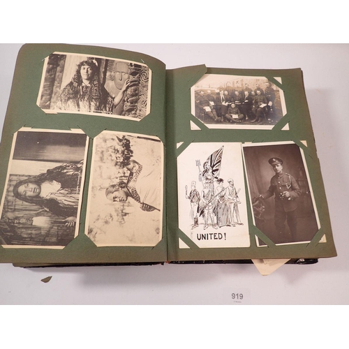 919 - An album containing postcards - military, suffragette cards, some topo, portraits etc. (around 220)