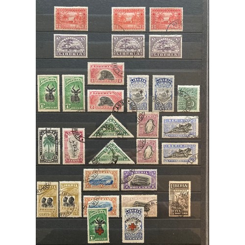 830 - Stamps of Liberia: Blue A4 stockbook of mint and used definitives, commemoratives, officials, air, p... 