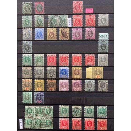842 - Stamps of Nigeria: Blue A4 stock-book of mint and used QV-QEII to 1964 post-independence including O... 
