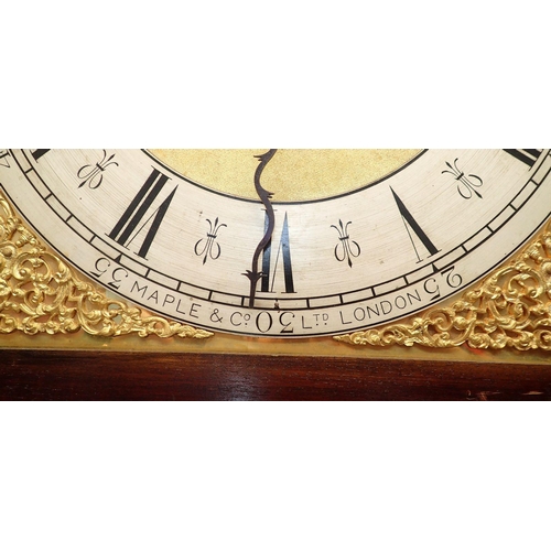 1009 - A Maple & Co mahogany longcase clock with broken swan neck pediment, brass broken arched dial, fretw... 