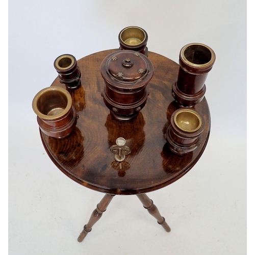 1010 - A Victorian mahogany finish smokers stand on turned supports