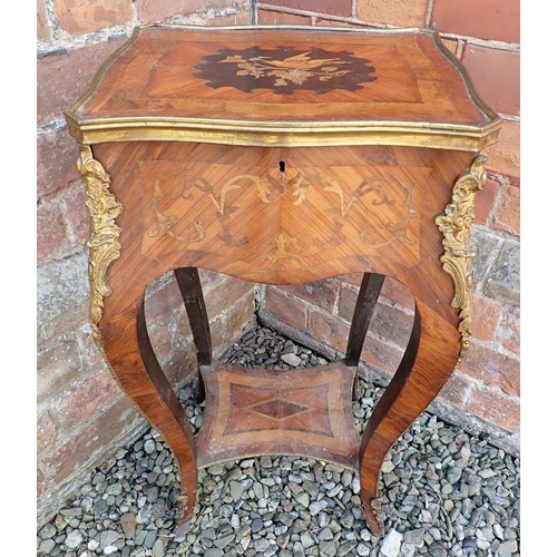 1011 - A late 19th century French small kingwood marquetry occasional table with rise top and bird decorati... 