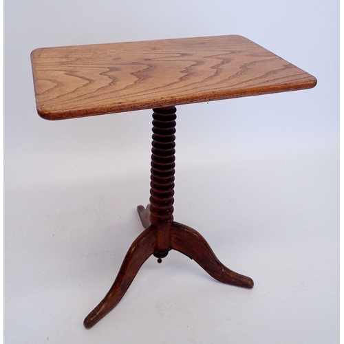 1016 - An oak tripod table on ring turned column, 55 x 35cm