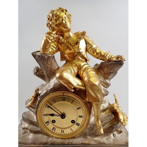 1018 - A fine 19th century French mantel clock with ormolu seated boy on silvered rocky base, with key and ... 