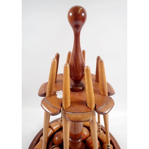 1019 - A Victorian table croquet set on turned mahogany  stand with mallets, balls, clamps and hoops