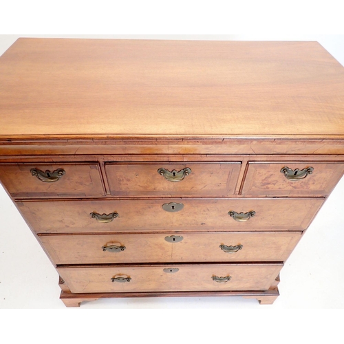 1020 - An 18th century walnut chest of three short and three long drawers with herringbone banding and bras... 