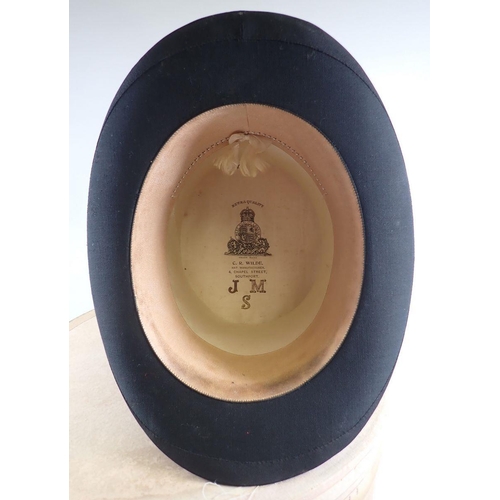 1025 - A small silk top hat by C R Wilde and a bowler hat by Eltome and Son, Ross 6 & 5/8th in original box