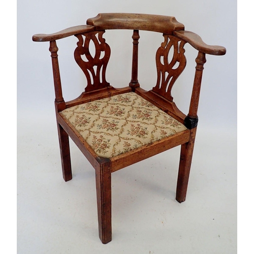 1032 - A Georgian mahogany captains corner chair with interlaced splat