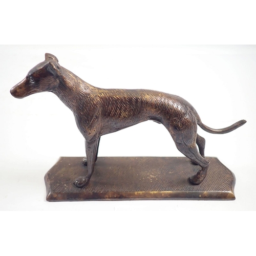 1041 - A bronze greyhound, 21cm wide