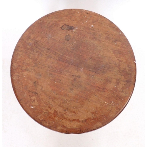 1042 - An American or Canadian mahogany revolving piano stool with gilt metal claw and glass ball feet