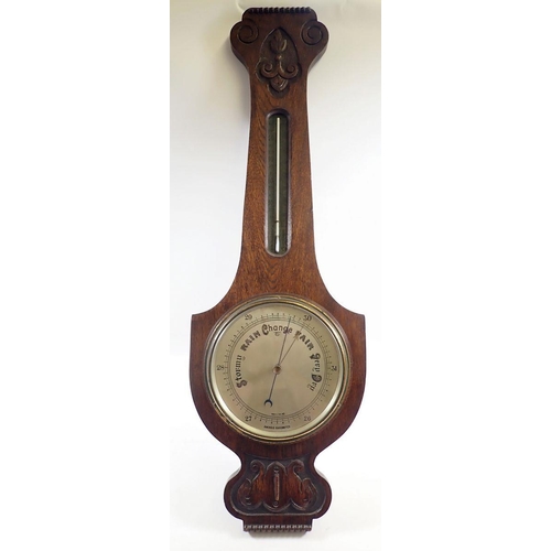 1045 - An oak aneroid banjo barometer with silvered dial and thermometer, 88cm tall