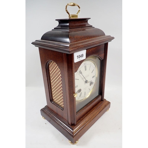 1049 - A Knight Gibbins mahogany cased bracket style mantel clock, 32cm tall