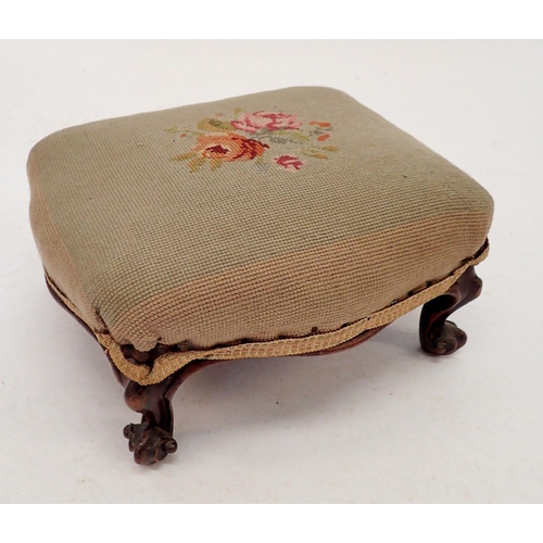 1053 - A Victorian tapestry top foot stool on scroll feet