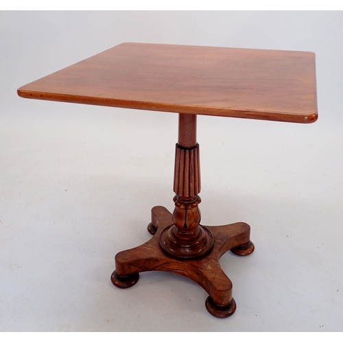 1064 - A Victorian mahogany occasional table on reeded column and triple curved supports, 65cm