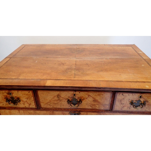 1065 - A mid-Georgian walnut chest on stand the crossbanded top with three short and three long drawers, th... 