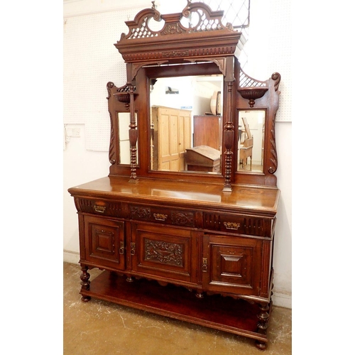 1076 - A Victorian mahogany mirror back sideboard with swan neck scroll pediment and carved decoration, 153... 